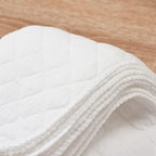 Reusable diaper inserts arranged for infant diapering system