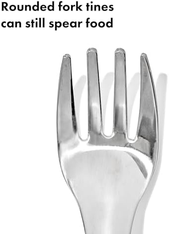 Toddler using OXO Tot stainless steel fork and spoon