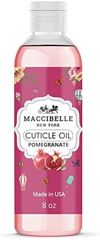 Close up of Maccibelle 8 Ounce pomegranate nail oil bottle for professional cuticle care