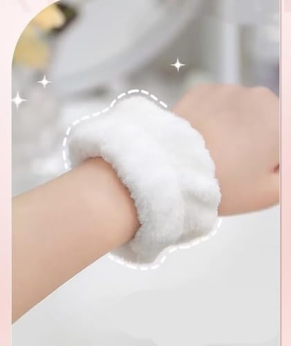 Person using absorbent wrist protectors during face wash