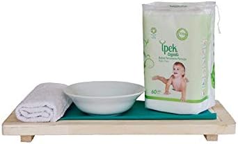 Ipek cotton pads being used with water for baby care
