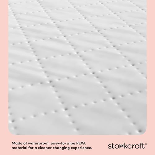 Storkcraft baby changing pad showing contoured sides