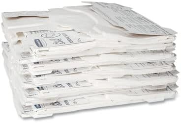 Scott flushable paper toilet seat covers pack being placed inside a wall-mounted commercial washroom dispenser.
