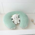 Two sides of the reversible Dilimi nursing pillow cover shown together