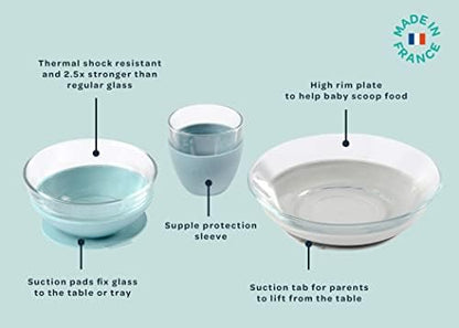 Beaba toddler glass meal set in Rain color showing suction base functionality