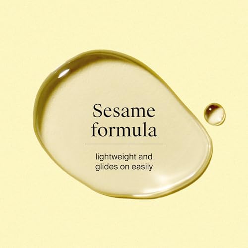 Neutrogena lightweight body oil locking in moisture on damp skin