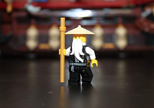 Authentic LEGO Sensei Wu collectible figure holding a brown staff weapon accessory