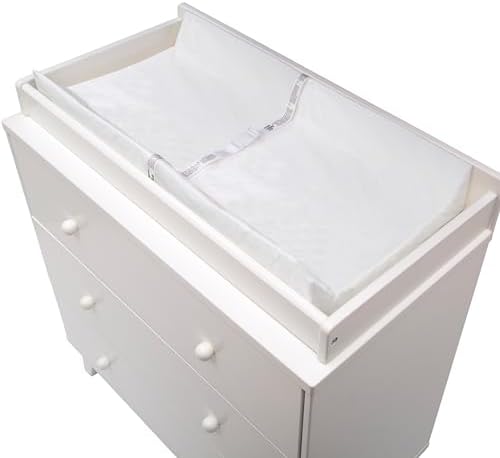 Delta Children Contoured Changing Pad packaged and ready for nursery