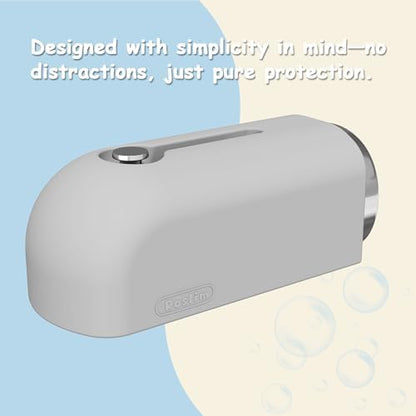 Minimalist Roslim bathtub spout cover being cleaned under running water for hygiene