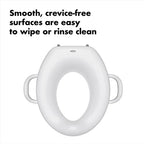Side view of OXO Tot sit right trainer seat featuring smooth seamless contours for kids