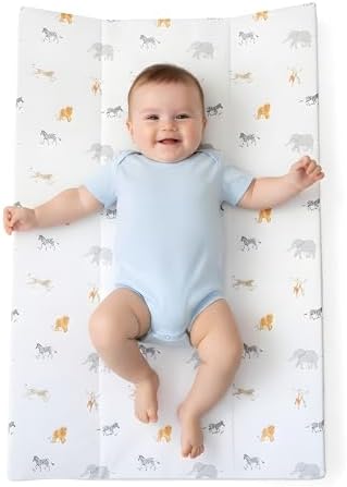Clair De Lune Baby Changing Mat placed on a nursery dresser
