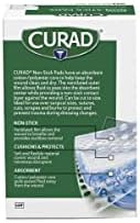 Individual sterile wrappers of Curad non stick dressings demonstrating hygienic wound care design.