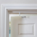 Predictable Solutions GlideLok metal door lock installed on door top