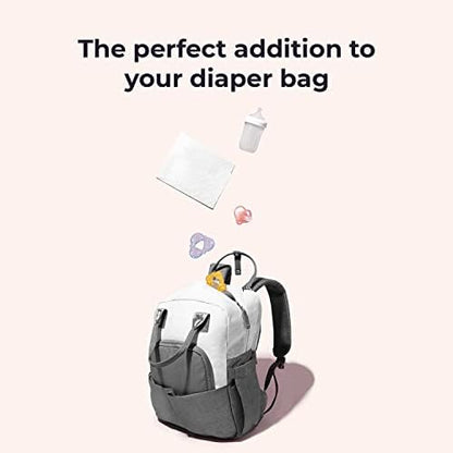 Baby on a Peekapoo disposable changing pad for mess-free change