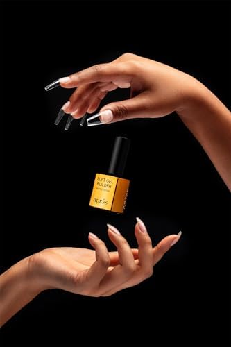Professional nail technician using AprÃ©s Soft Gel Builder
