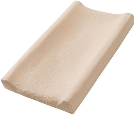 Elasticated corners of Little Jump changing pad cover showing secure fit design