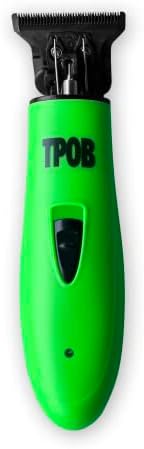 Ergonomic side profile of the matte green TPOB hair clipper showing the power switch and grip texture.