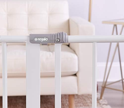 Regalo pressure mounted pet and toddler gate with extension kits attached for hallway fitting.