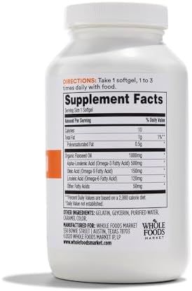Side view of 365 Whole Foods cold pressed flaxseed oil supplement bottle showing ingredient details.