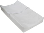 Delta Children Contoured Changing Pad angled view with safety strap