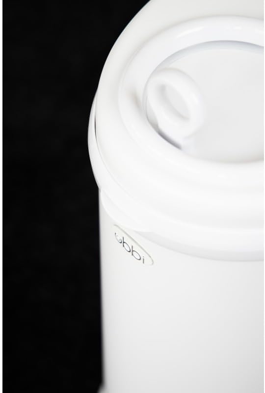 Ubbi steel nappy disposal bin showing sliding lid and childproof lock mechanism