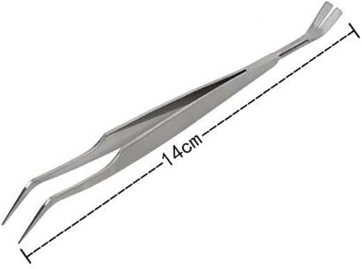 Close up of dual-tipped tick remover tool for pets