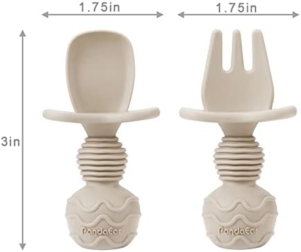 Toddler using ergonomic silicone fork and spoon set