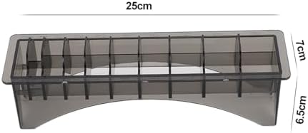Close up view of the empty ten grid segmented base of the hair trimmer guard container.
