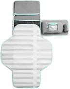 Munchkin baby diaper changing mat unfolded displaying the extra-large twenty-eight by twenty-two inch waterproof surface.