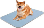 Buvlnee ice silk self cooling pad spread out on a living room floor.