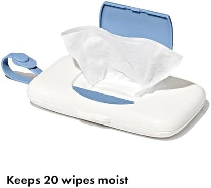 OXO Tot On-The-Go Wipes Dispenser being filled with baby wipes