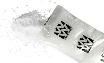 Fragrance-free quick melting paraffin wax pastilles poured out to show pellet texture