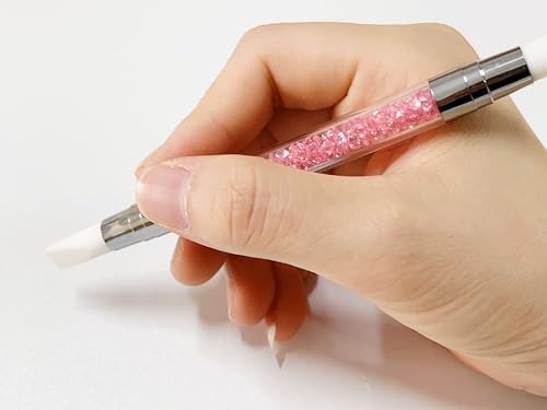 Professional nail art manicure tools displayed on a flat surface