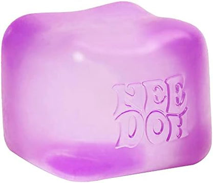 Hand squeezing a purple nice cube fidget toy showing its flexible solid gel material.