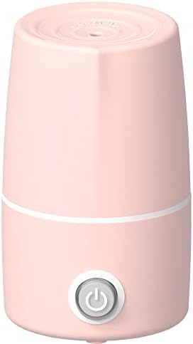 Side profile of Mottery pink sterilizer showing sleek portable design