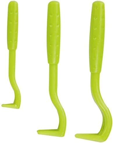 Three green and blue tick removal hooks for dogs
