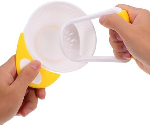 Compact lidded baby food maker set packed together for travel convenience