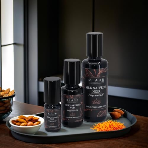 Nuvana Silk Saffron Noir perfume oil bottle in travel bag