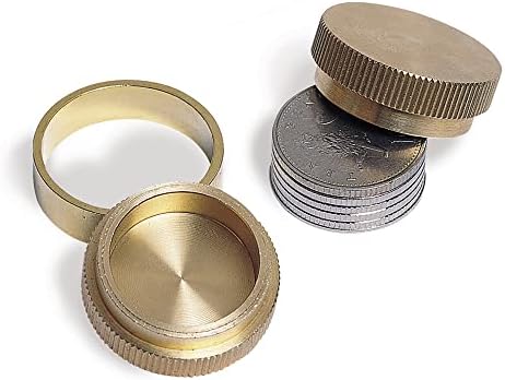 Close up of solid brass magic cylinders and rings