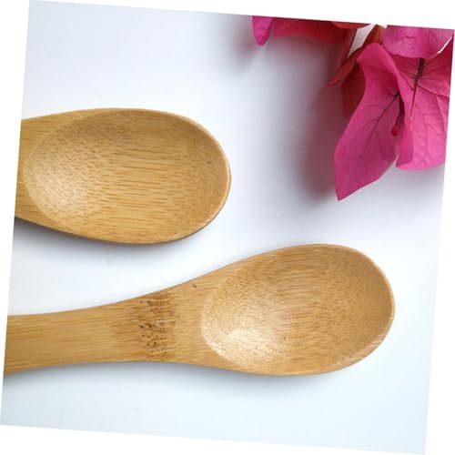 Ten pieces of FRCOLOR sustainable wood sporks stacked together highlighting the compact and lightweight travel cutlery set.