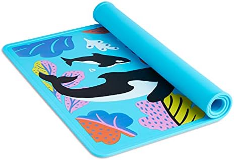 Munchkin silicone toddler dining mat flipped over to display the bright solid color reverse side