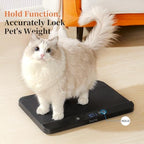 YauYik automatic hold function scale tracking weight of a moving puppy.