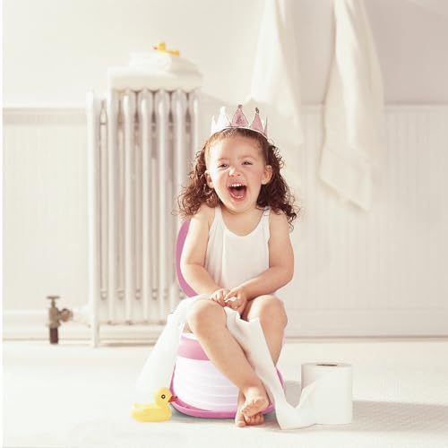 Toddler using Spark Moments travel potty outdoor