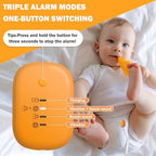 Rechargeable bedwetting alarm with USB cable and tracking stickers for kids.