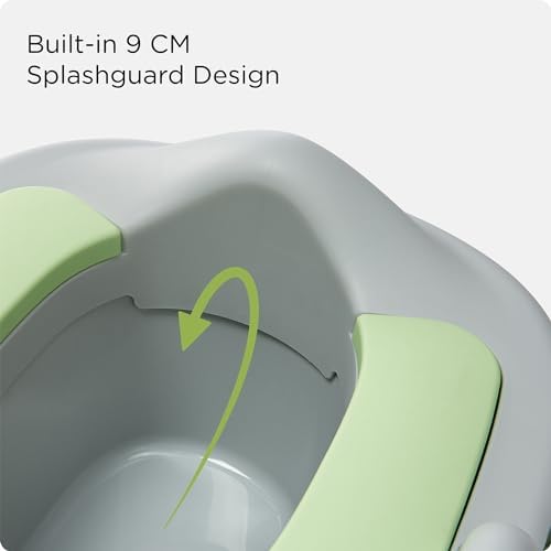 Toddler using KÜB 3-in-1 potty seat on standard toilet