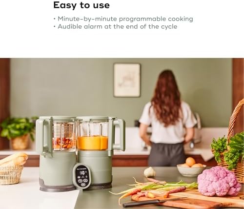 Babymoov multi speed food maker blending fresh organic vegetables into a smooth baby puree