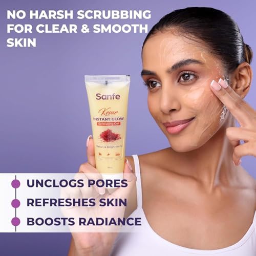 Model applying the alpha hydroxy acid brightening gel to the face for quick de-tan action