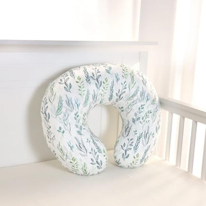 Top view of green leaf print baby pillow slipcover