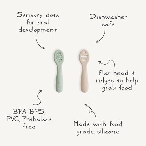 Two pack of Mushie silicone baby spoons for self feeding showing ergonomic short handles