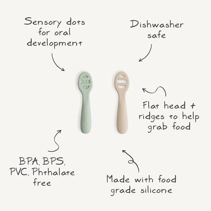 Two pack of Mushie silicone baby spoons for self feeding showing ergonomic short handles